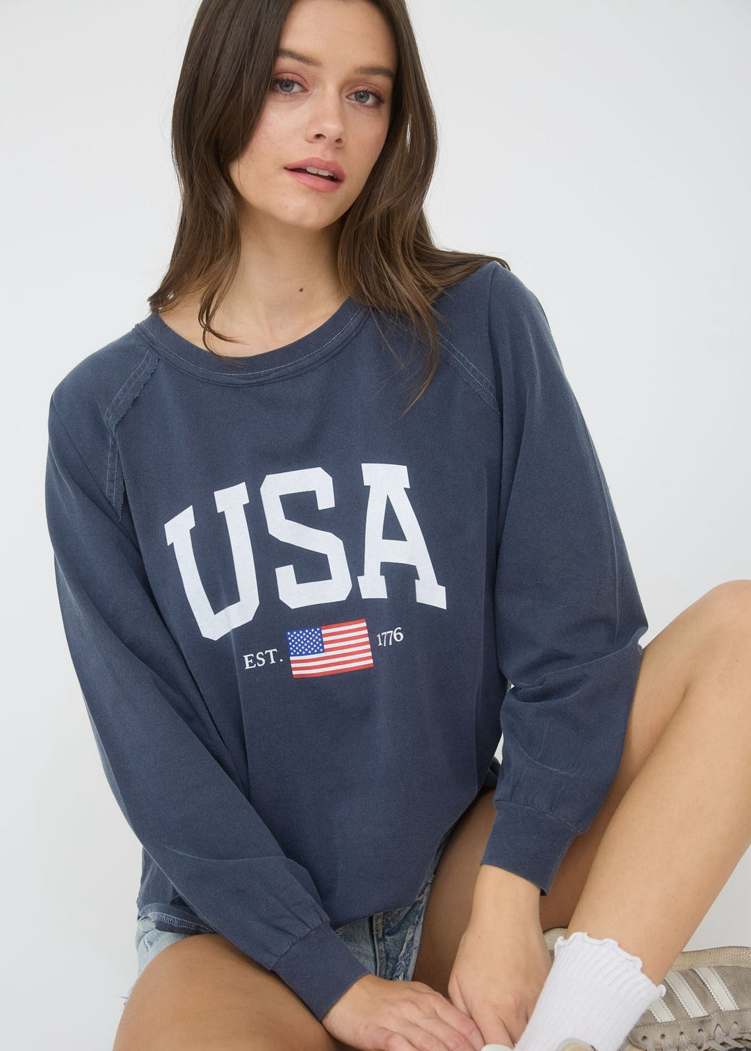 Woman wearing a navy blue &